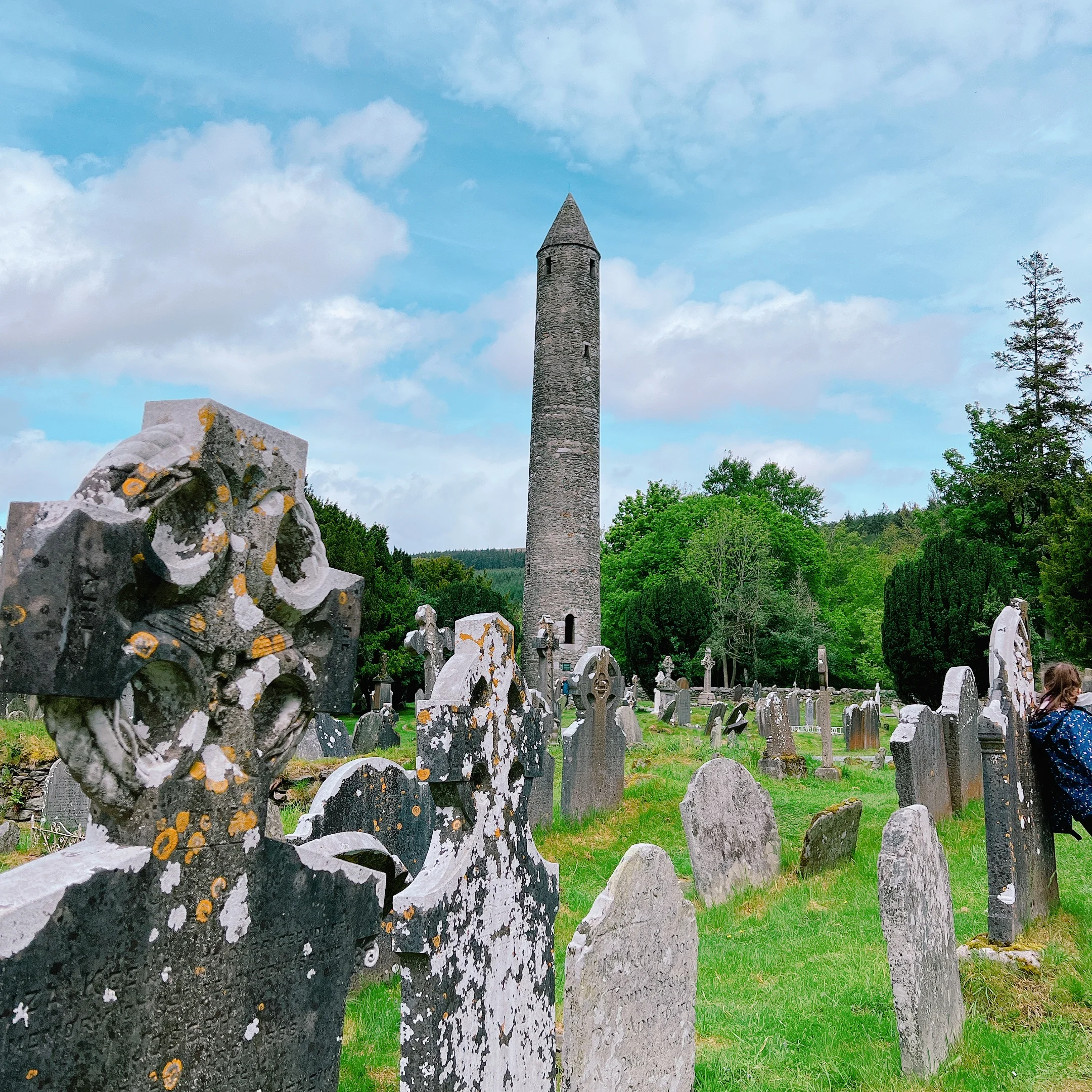 Glendalough tower and landscape in Ireland